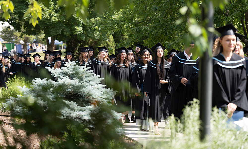 Graduates walking in their gowns